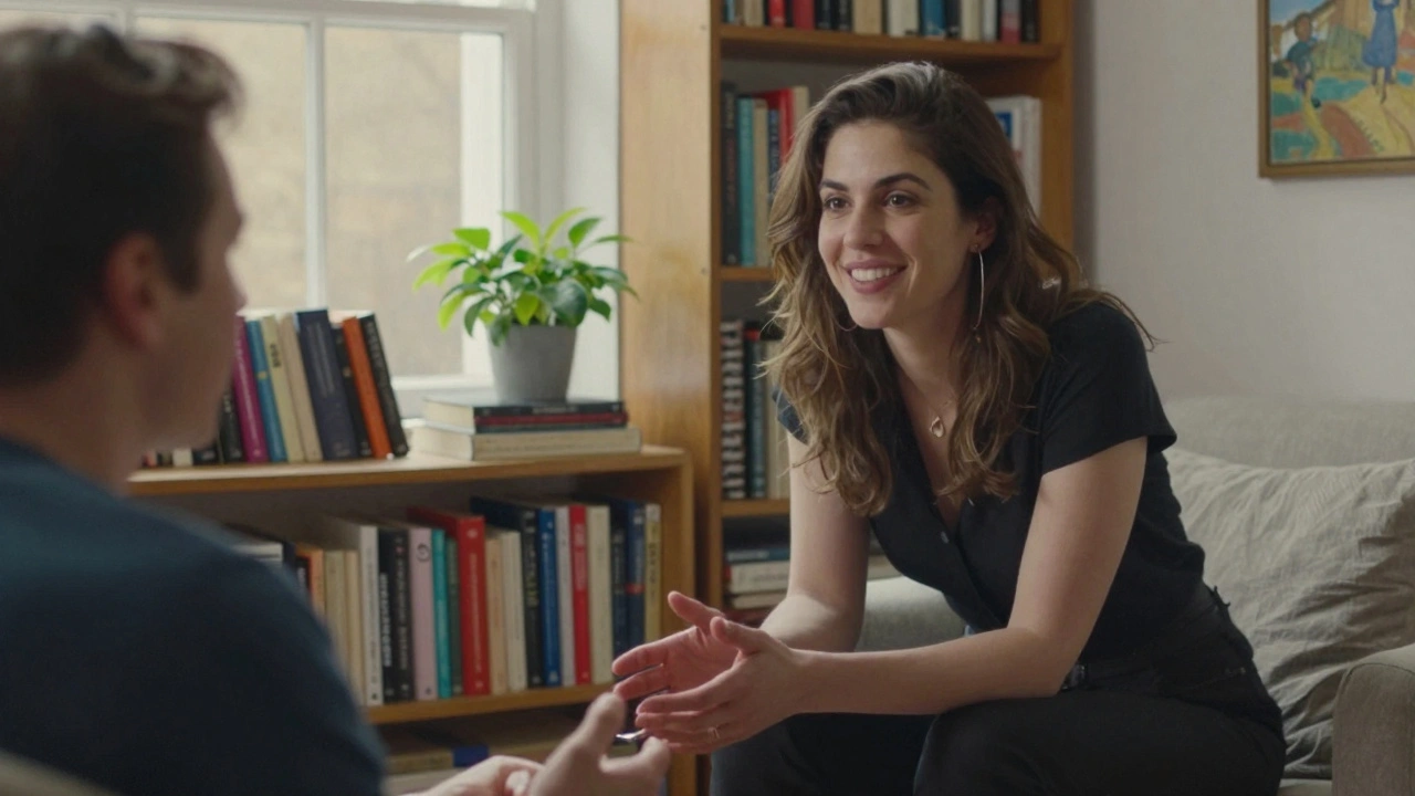 An escort in a book-filled flat listening attentively to a client, natural light highlighting genuine connection.