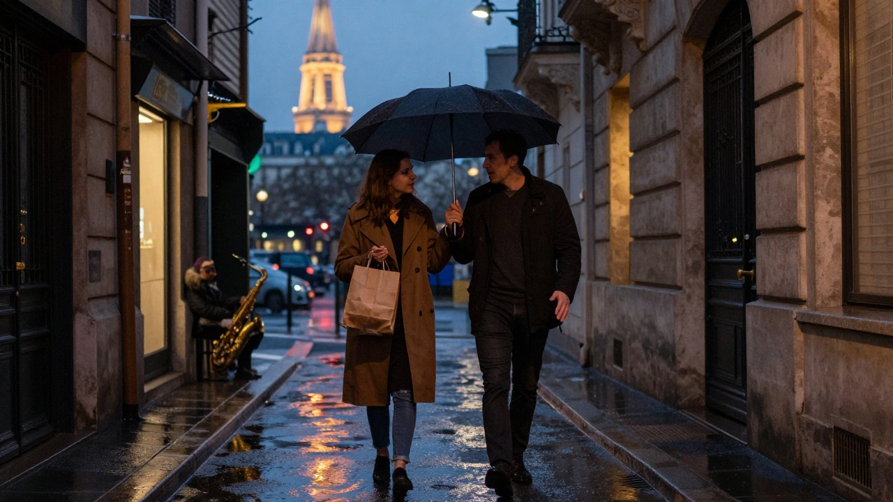 Two people walking quietly under an umbrella along a rain-drenched Paris alley at dusk.