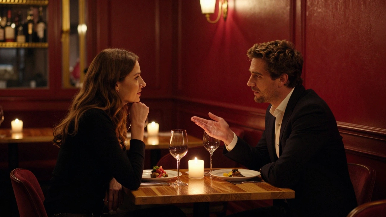 Two people dining privately in a dim restaurant
